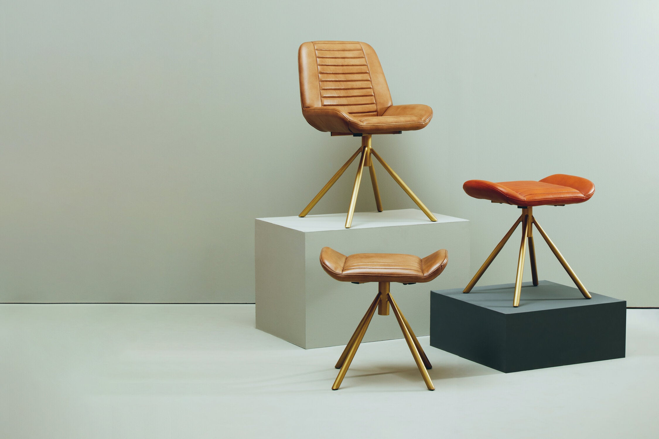 Buffalo Tan Leather and Gold Finish Footstool