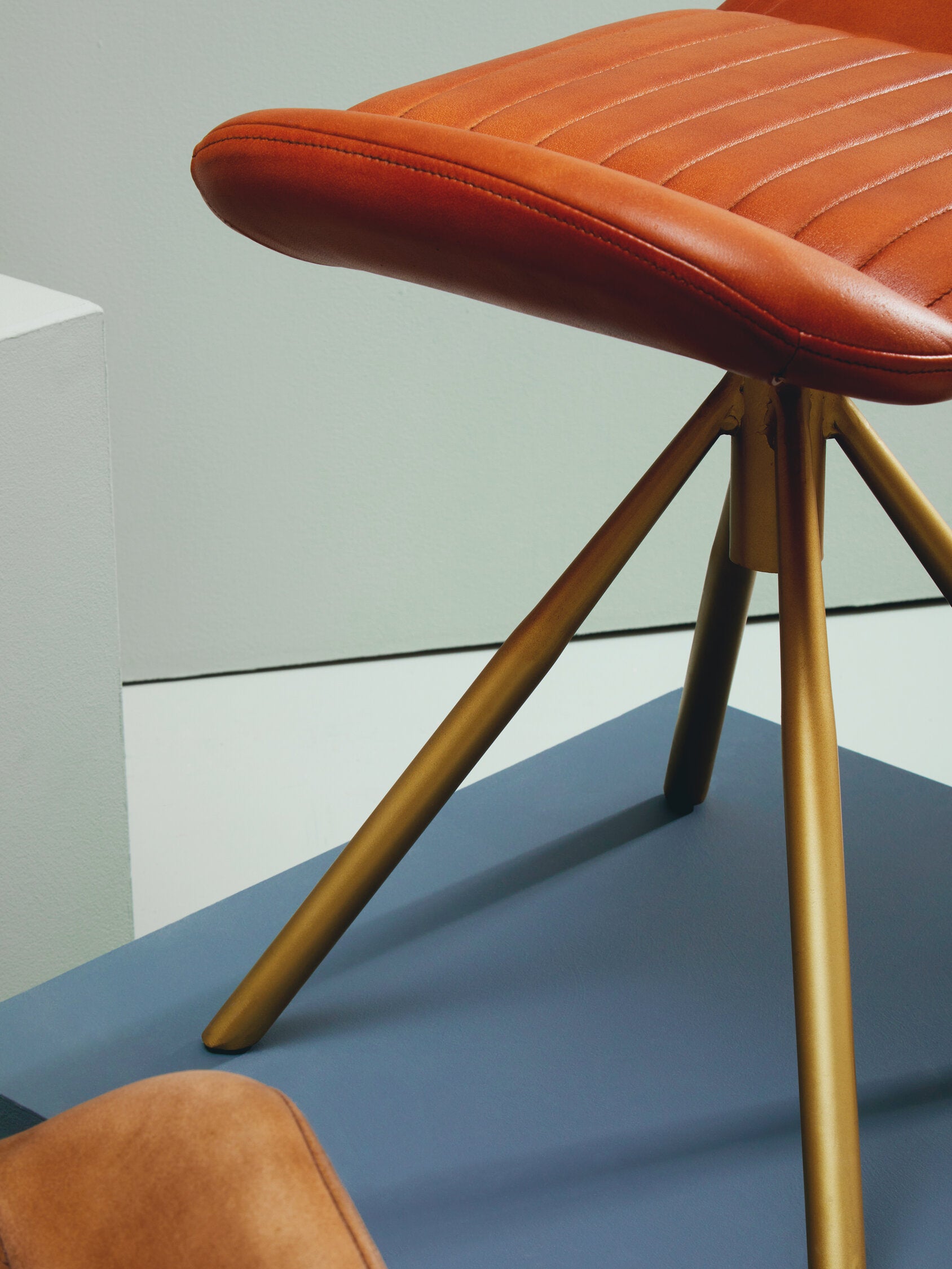 Buffalo Tan Leather and Gold Finish Footstool