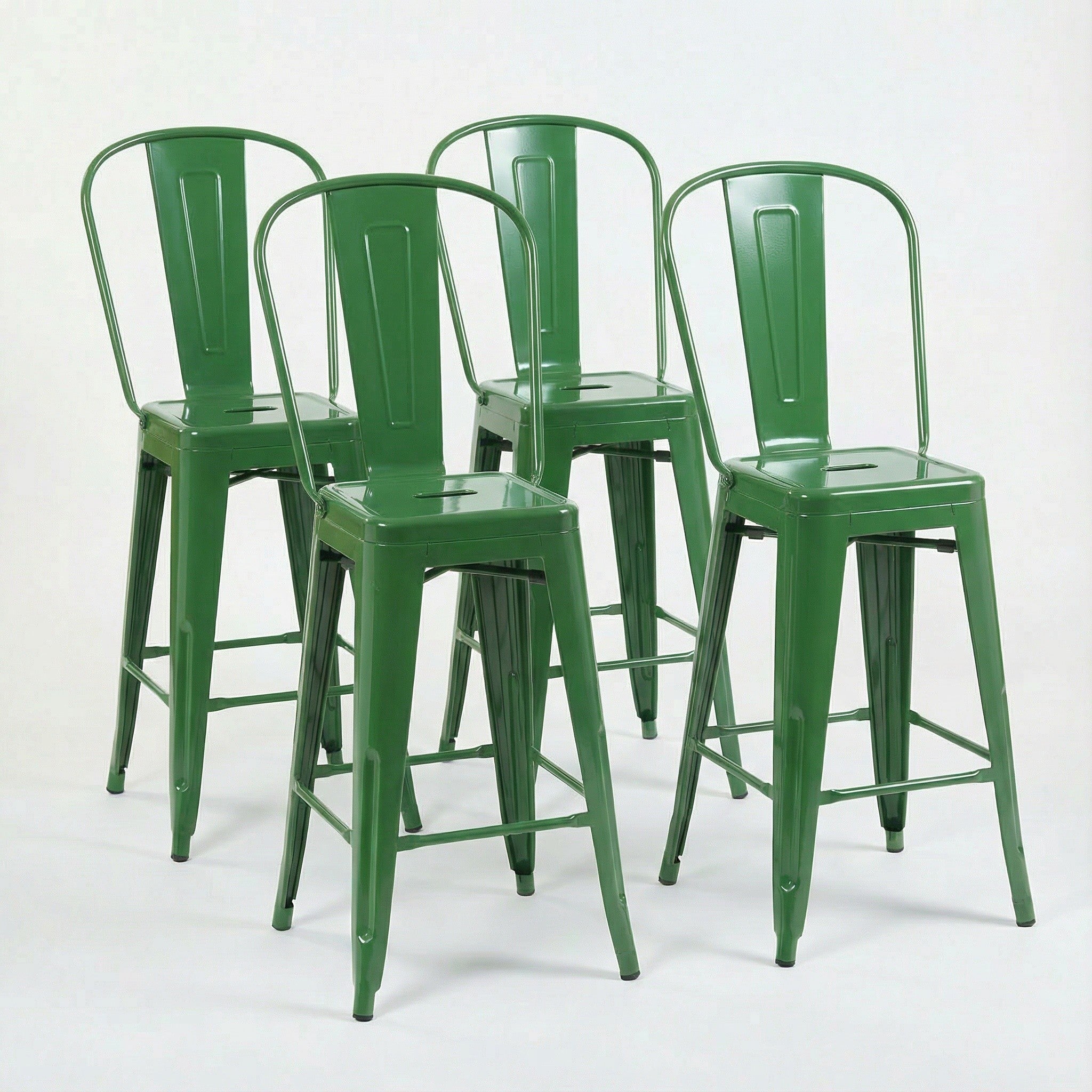 Four green metal bar stools on a white background